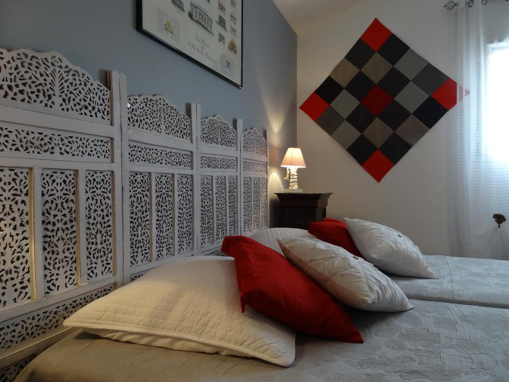 Une Chambre En Ville Savigneux  Rom bilde